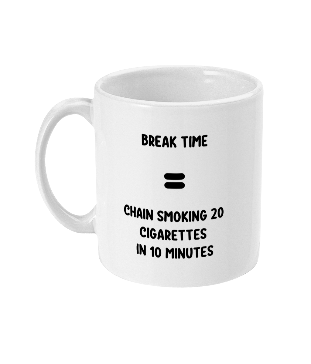 A 11oz glossy white mug with the quote 'Break time = Chain smoking 20 cigarettes in 10 minutes' in black bold font placed in its centre. The mug is placed against a white back ground. 